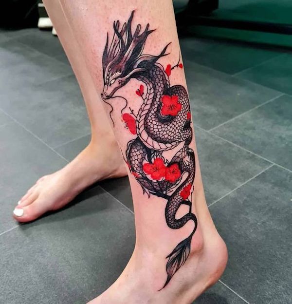 Colorful Traditional Dragon Tattoo On Leg