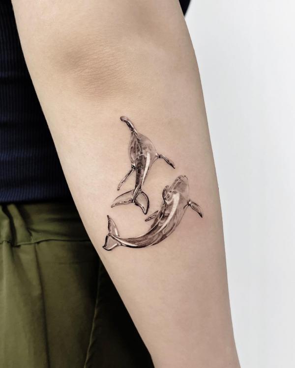 Two crystal dolphin tattoo