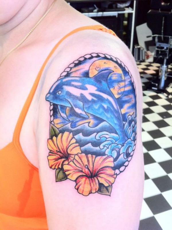dolphin and hibiscus tattoo