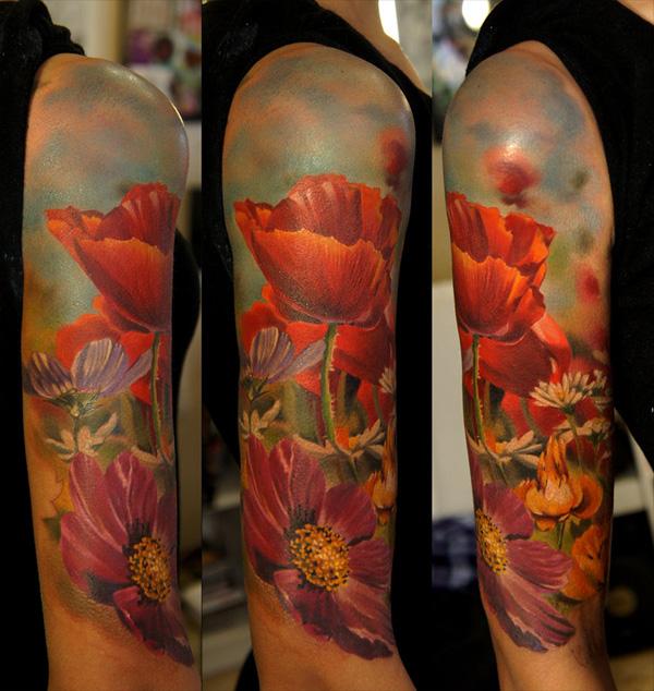 Tattoo uploaded by Tattoodo  sleeve floral poppy hummingbird nature   Tattoodo