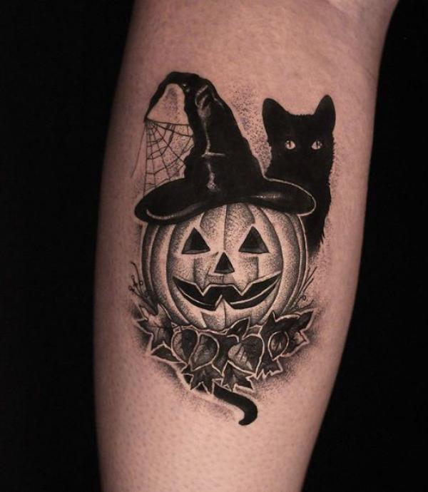 Black and Grey Jack O Lantern and black cat tattoo