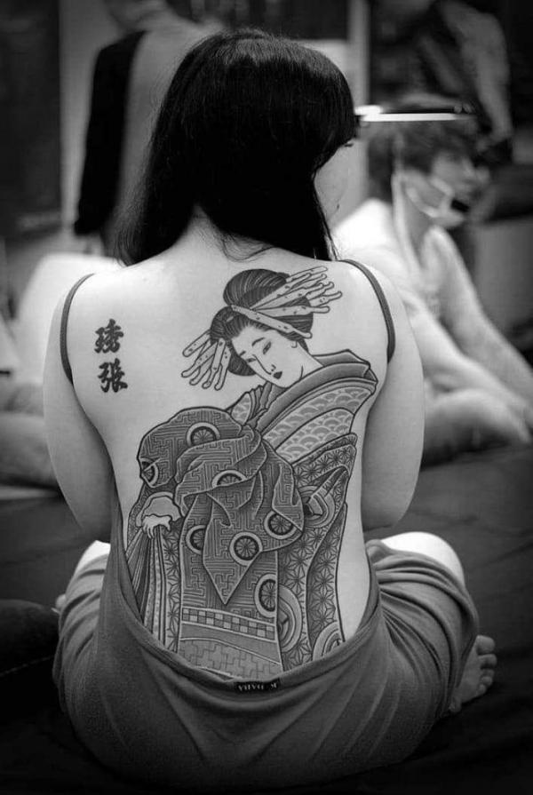 Black and grey geisha lady tattoo on back