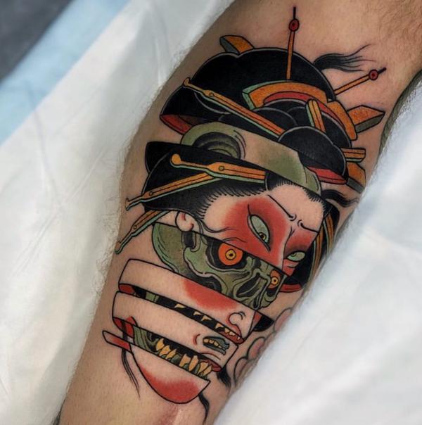 Broken geisha face and hannya mask tattoo