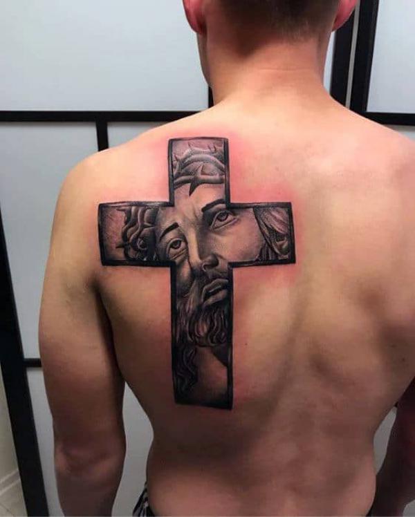 Cross tattoo with the face of Jesus as background