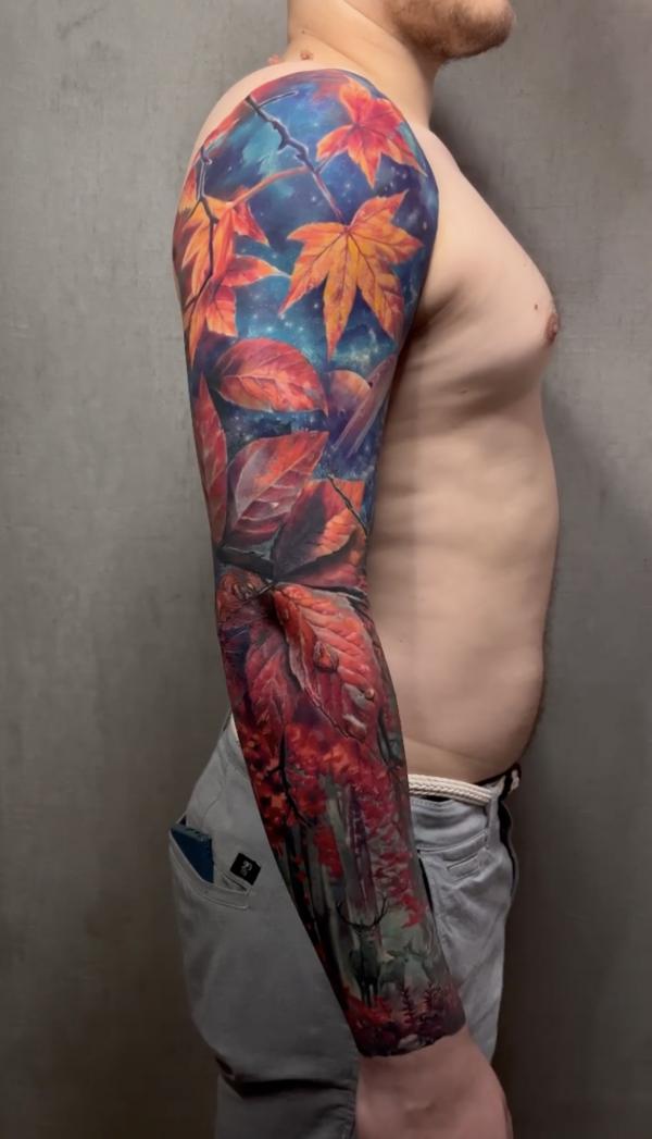 Fall leaves full sleeve tattoo with a deer