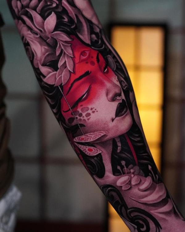 Geisha face with leaves sleeve tattoo
