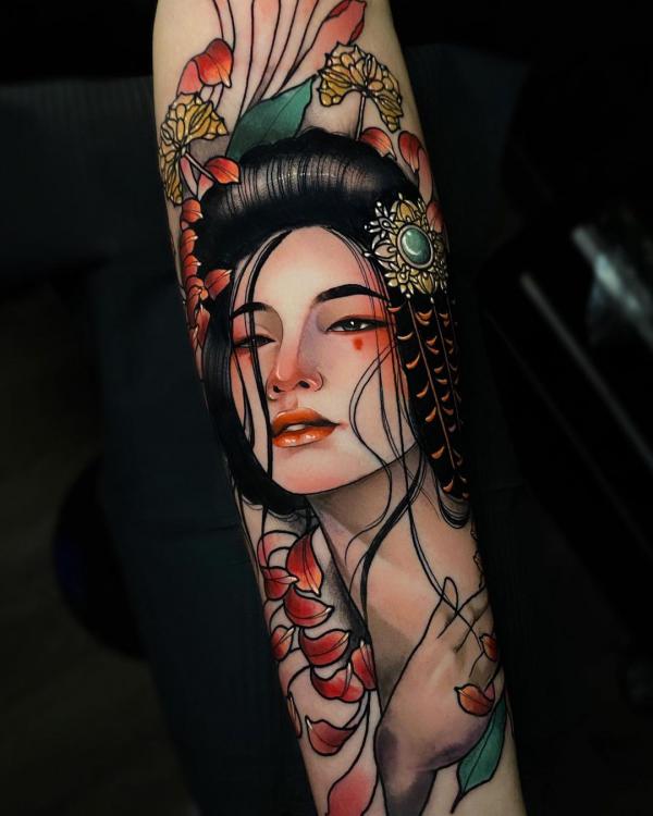 Geisha lady tattoo with petals of chrysanthemum