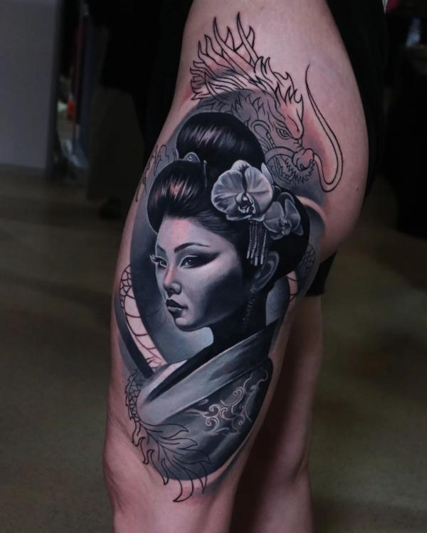 Geisha portrait thigh tattoo