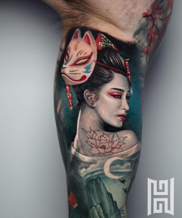 Geisha with Kitsune mask bicep tattoo