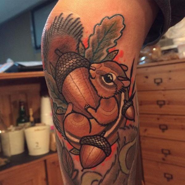 Neo traditional squirrel and acorn tattoo
