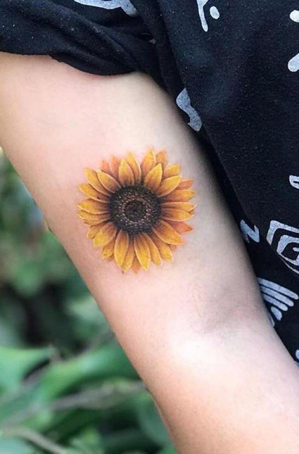 Small dainty sunflower tattoo