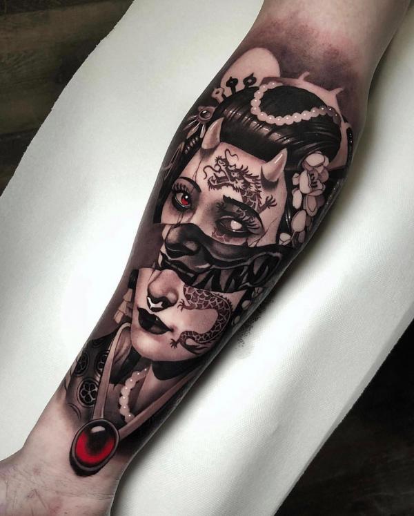 Splitting geisha face tattoo