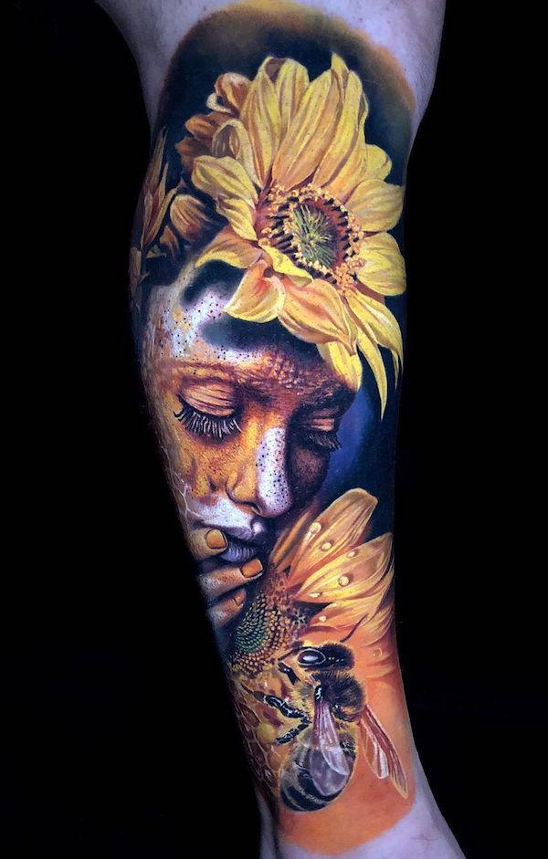 Sunflower face tattoo