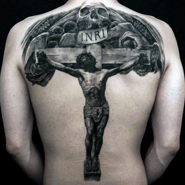 crucifixion of Jesus with skull and the word INRI