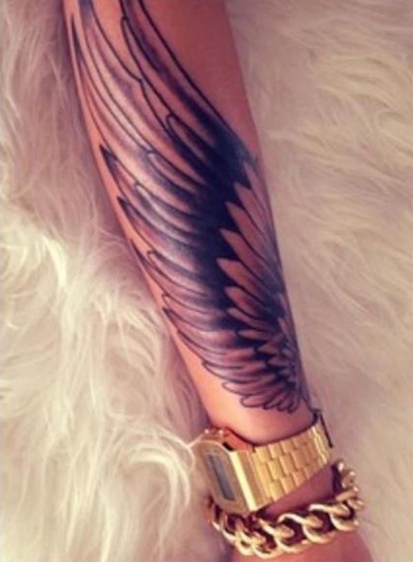 wing tattoo forearm