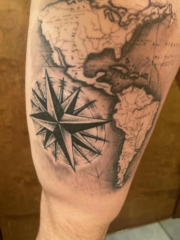 America map and compass tattoo