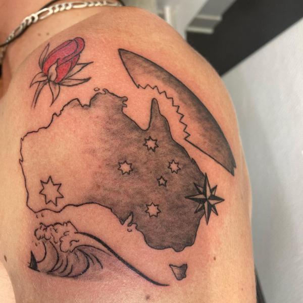 Australia map with ocean elements tattoo