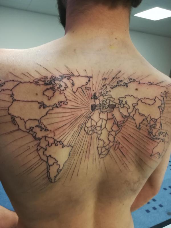 Back world map tattoo with hao