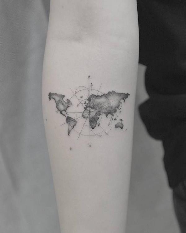 Black and grey small map tattoo on forearm