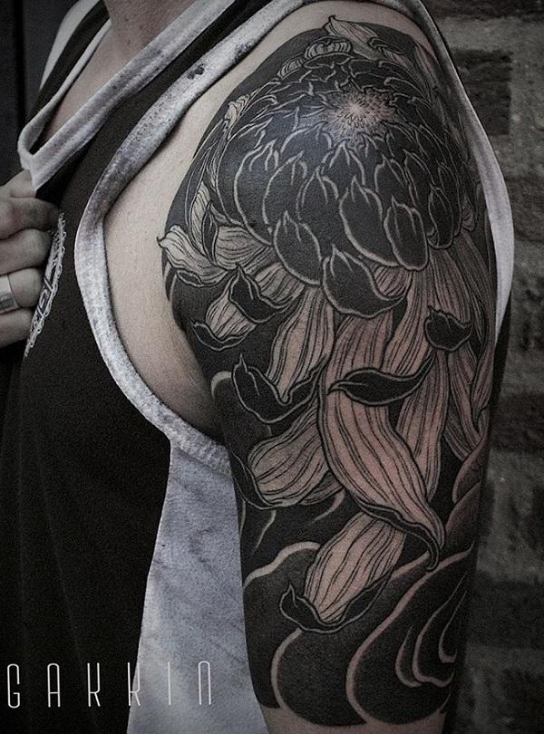 Blackout tattoo with Chrysanthemum texture
