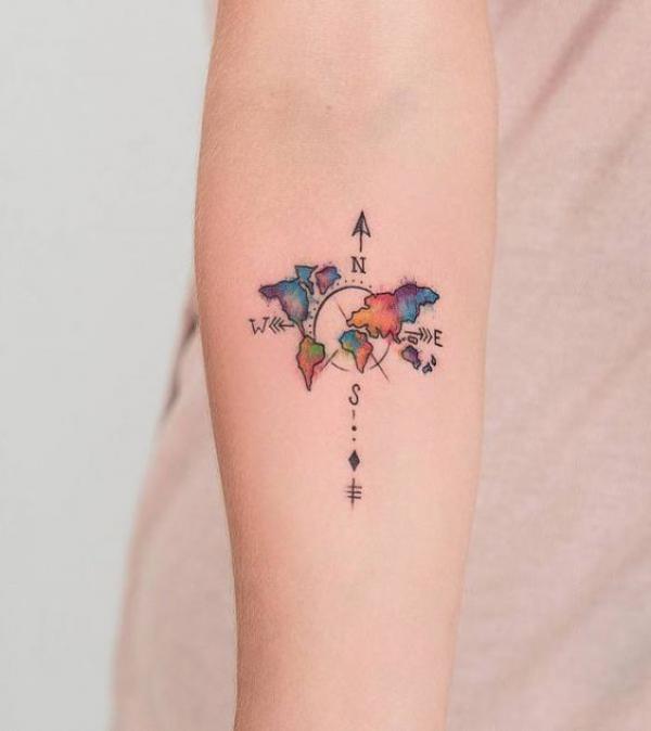 Colored small world map tattoo