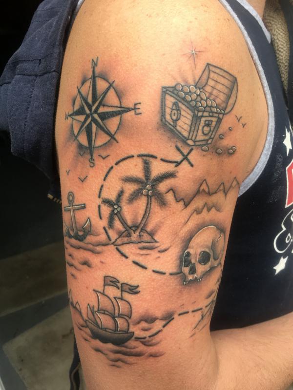 Pirate and treasure map tattoo