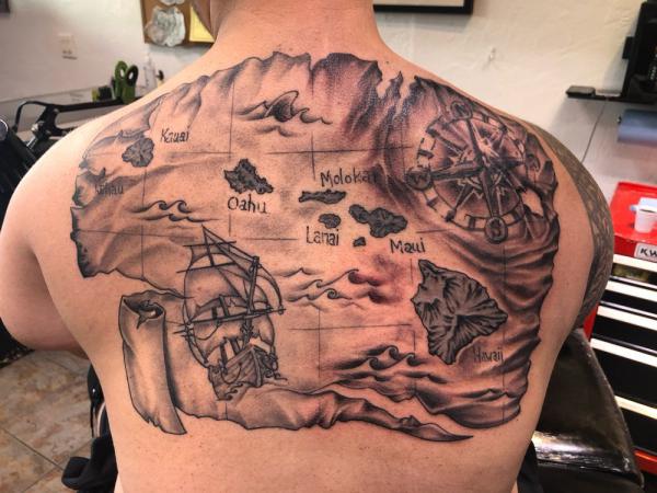 Treasure map back tattoo