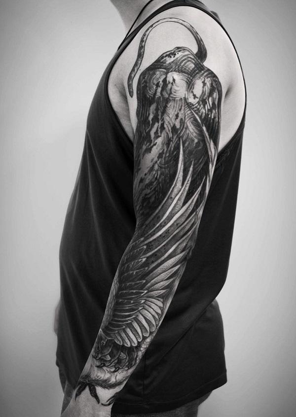 55+ Ingenious Angel Wings Tattoo Designs for Men & Women