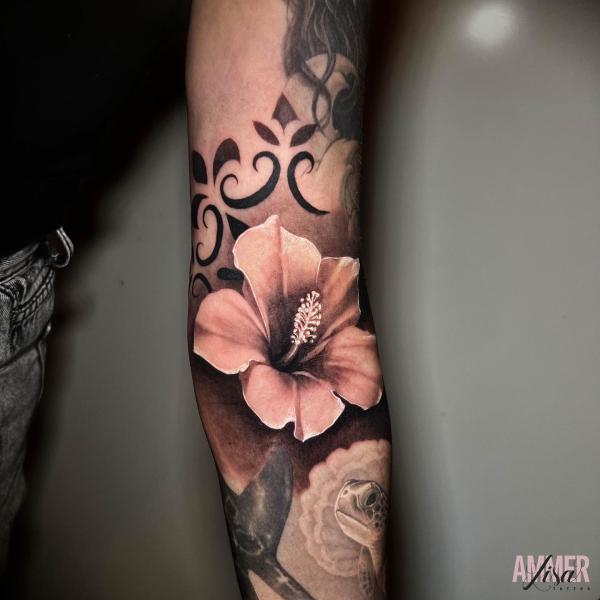 Hibiscus inner elbow tattoo