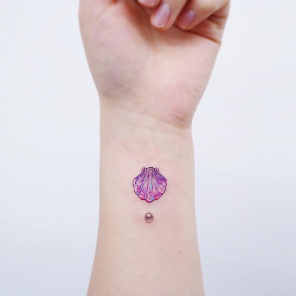 Colored shell and pearl tattoo