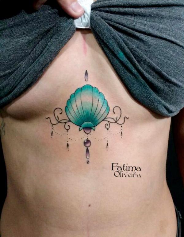 Female shell sternum tattoo