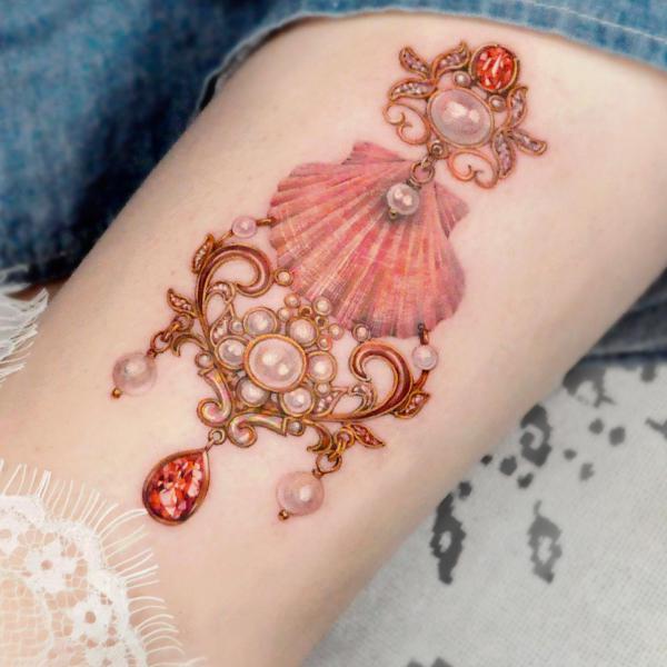 Feminine shell with pearls jewelry pendant tattoo
