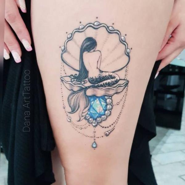 Mermaid in shell tattoo