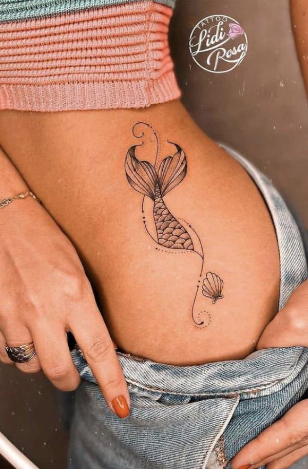 Mermaid tail and shell side tattoo