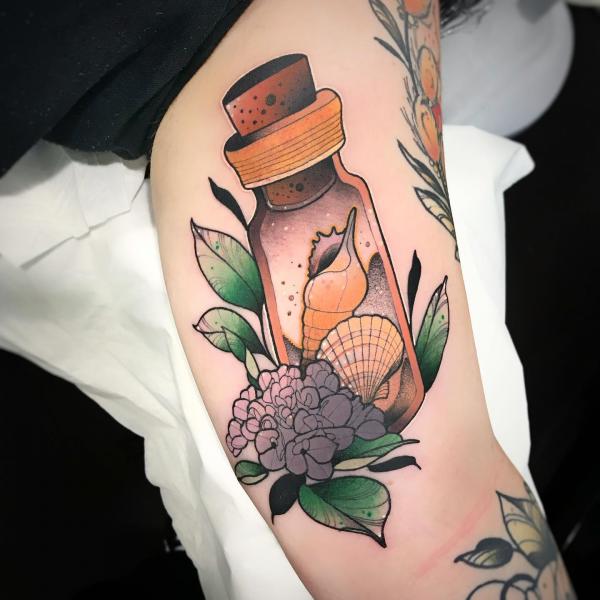 Neo traditional shells in bottle with flower tattoo