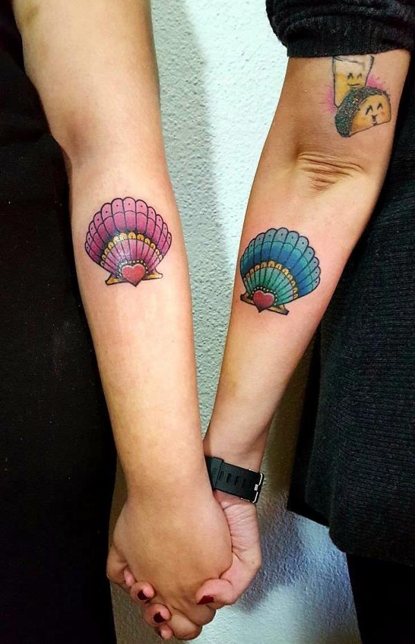 Red and blue loving shell matching tattoo