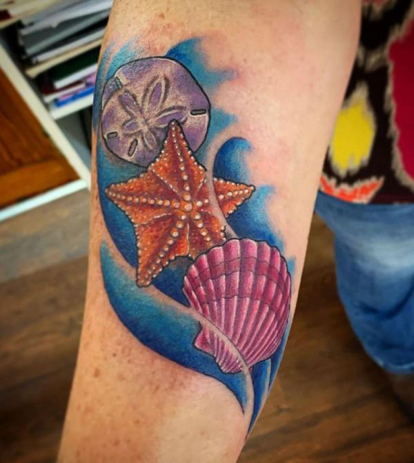 Sand dollar starfish and Scallop shell tattoo