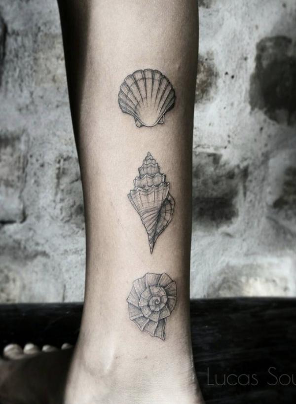 Scallop conch nautilus forearm tattoo greyscale