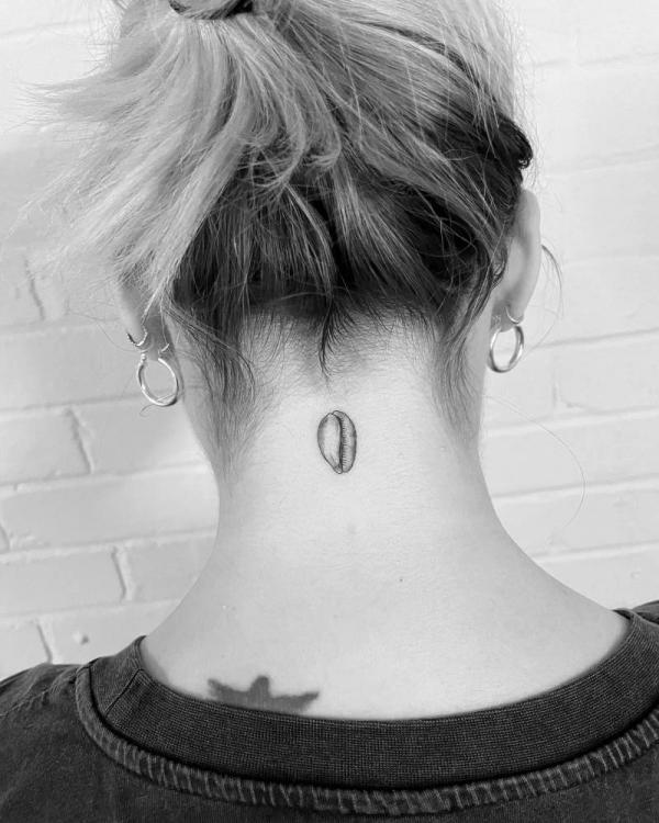 Tiny cowrie shell nape tattoo black and grey