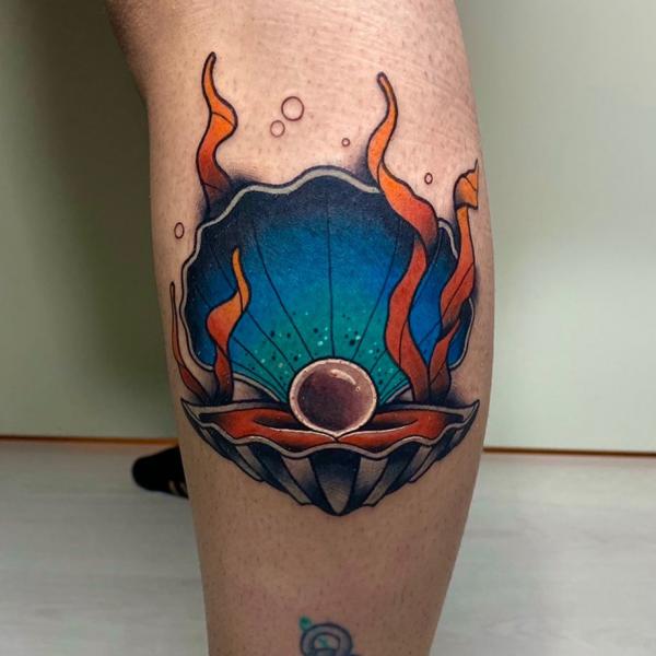 Traditional shell with pearl in water tattoo