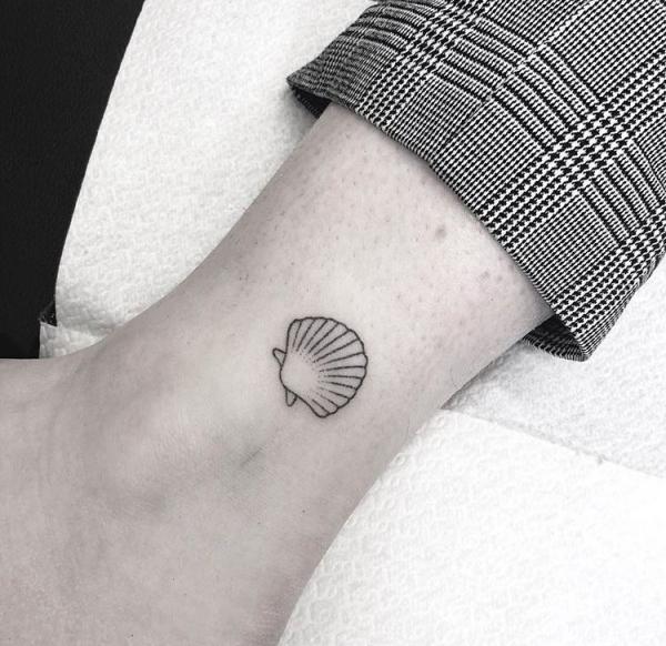 camino scallop ankle tattoo