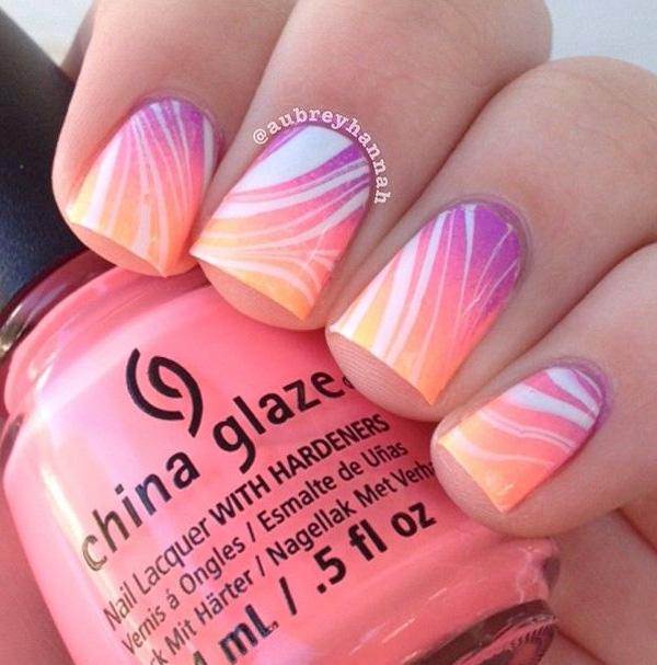 Add dram to your gradient nail art theme by adding strips of white water marble nail art polish.