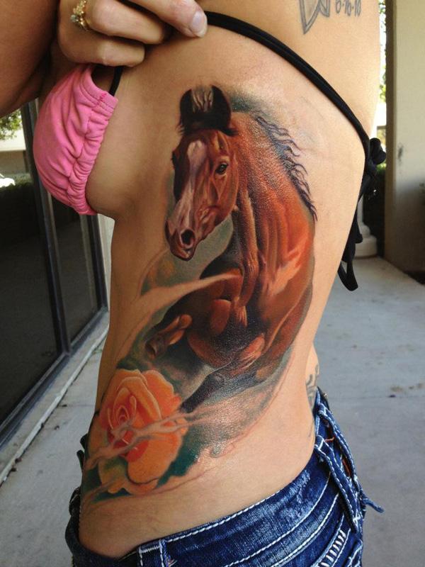 Horse and rose tattoo on side