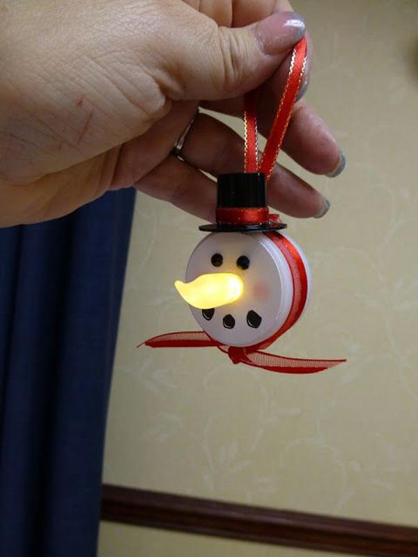 Snowman Ornament Made with battery operated tea light