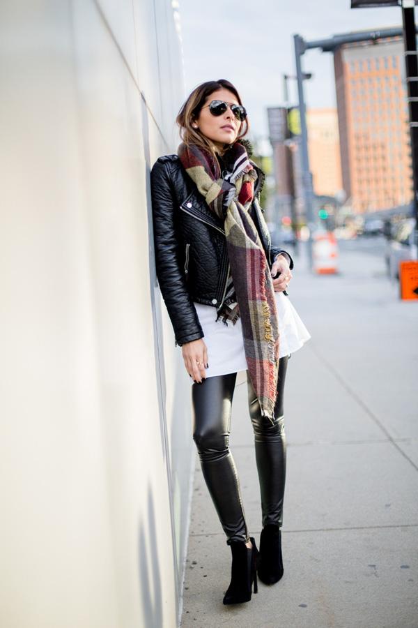 dares to wear leather on leather in a badass leggings and jacket combo.