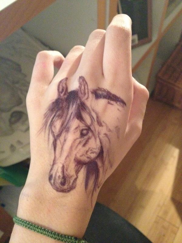 horse tattoo on hand
