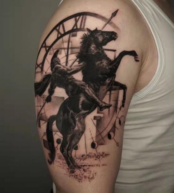 Clock and warrior riding a horse tattoo
