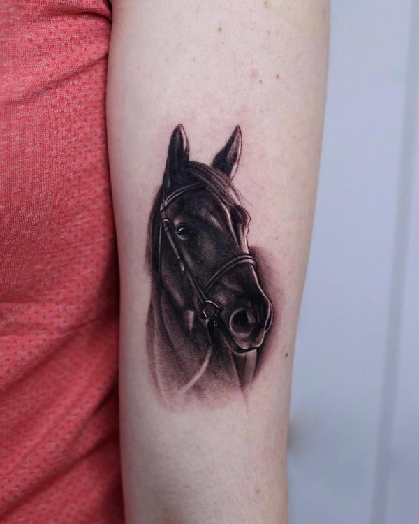 Dark horse head tattoo