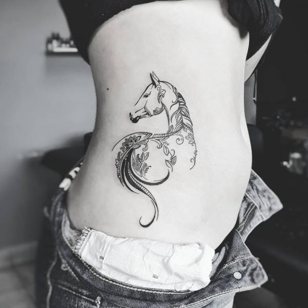 Feminine botanical Horse side tattoo