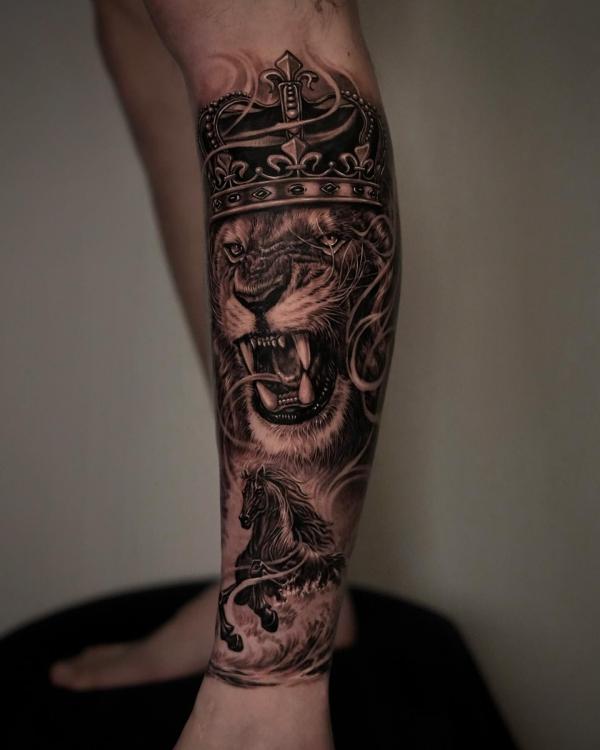 Horse and lion king lower leg tattoo